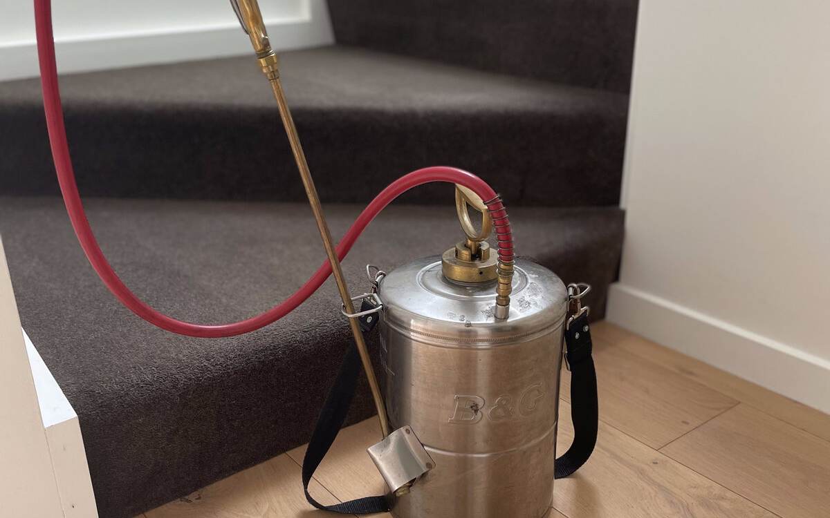 flea treatment sprayer on stairs, CPH Services Gold Coast