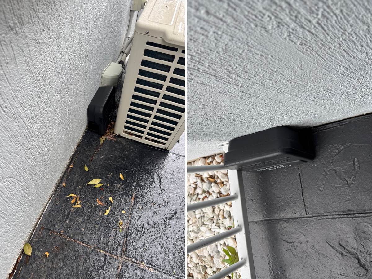 rodent control Robina, a lockable bait station tucked beside an air conditioning unit and a second station against the house wall CPH Services Gold Coast